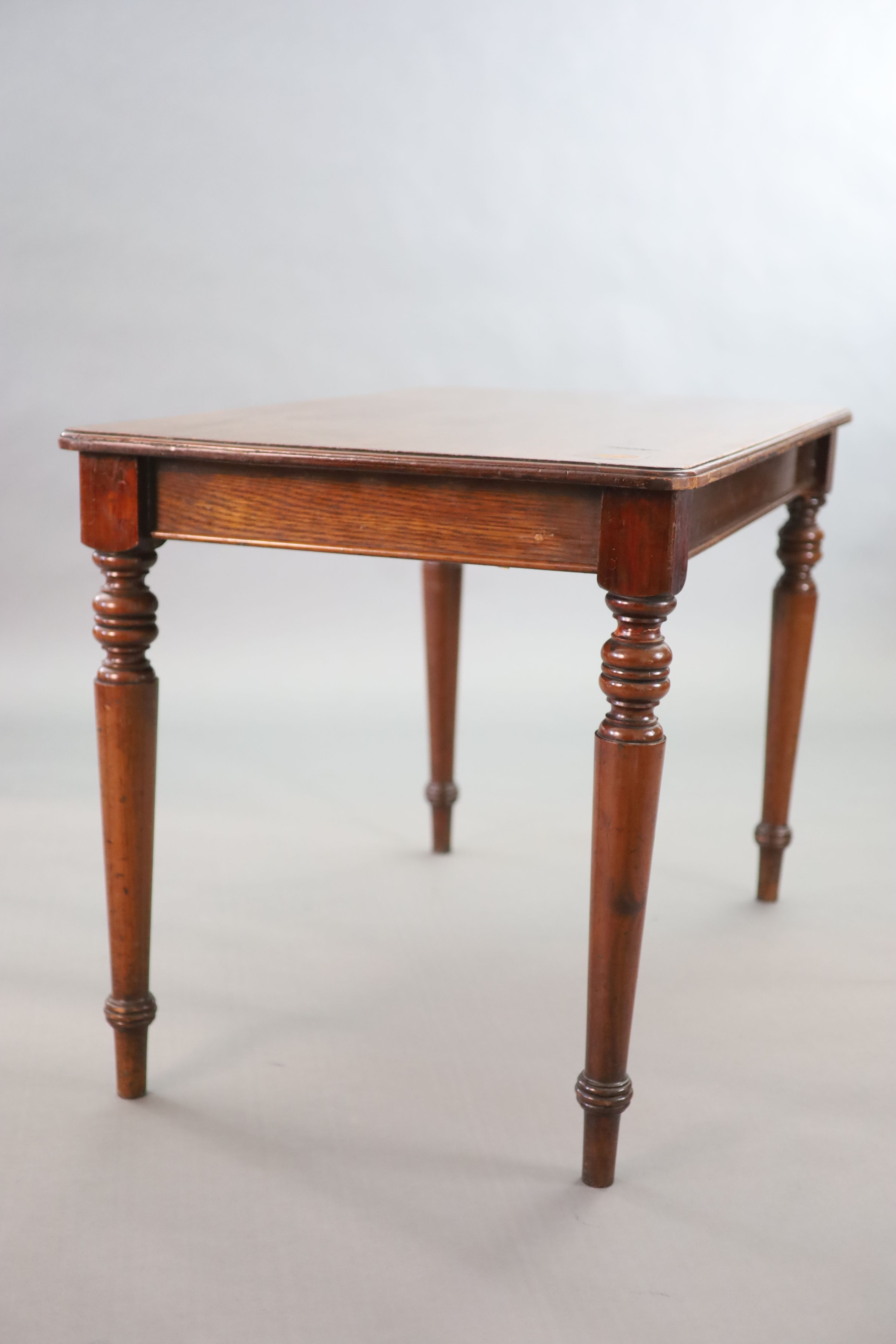 A pair of late Victorian mahogany writing tables, W.112cm D.68cm H.77.5cm